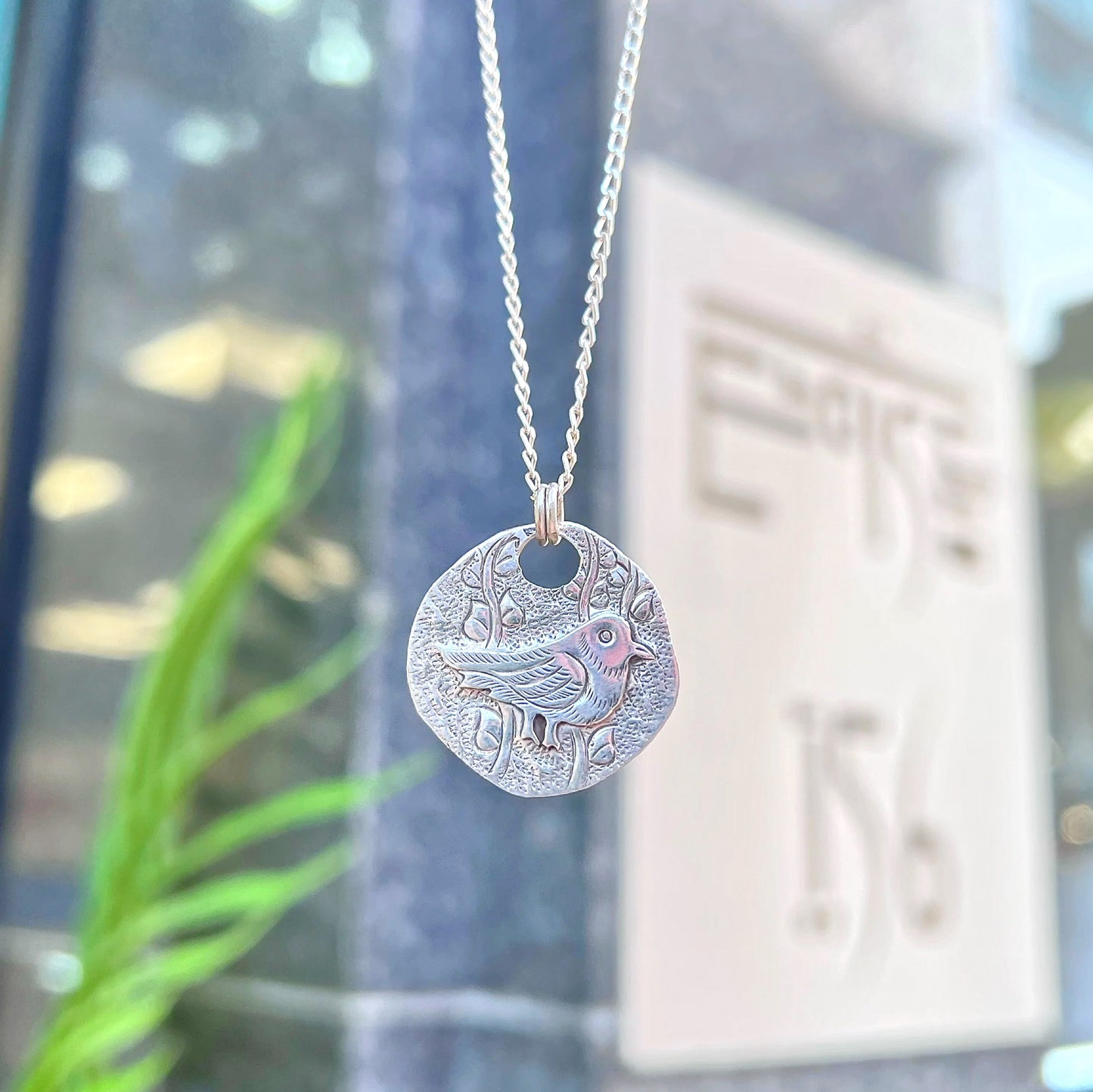 Sterling Silver Bird Motif Coin Necklace