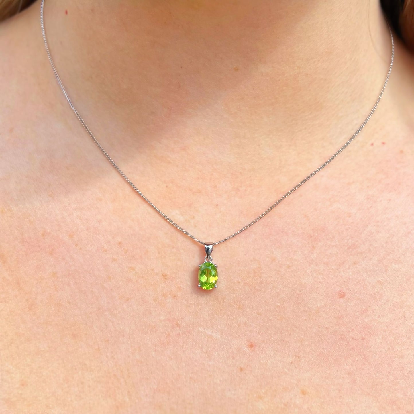 Elegant Sterling Silver Oval Claw Set Peridot Necklace and Earring Set