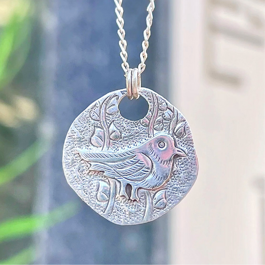 Sterling Silver Bird Motif Coin Necklace