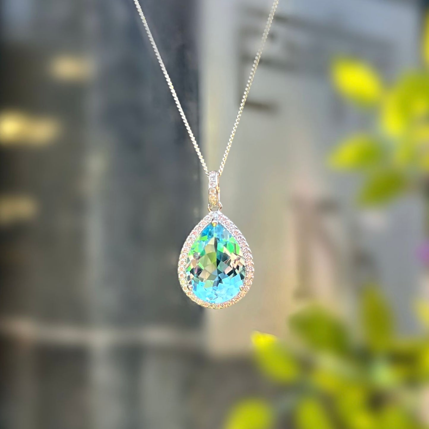 Sterling Silver Pear Cut Blue Topaz & Cubic Zircoa Necklace