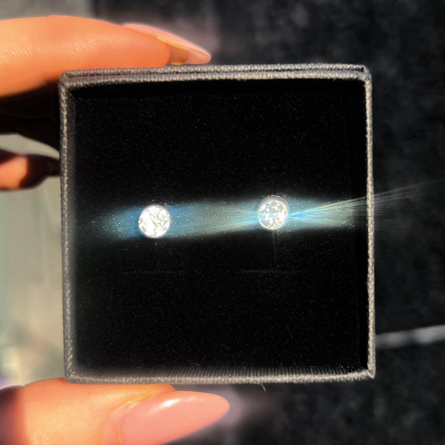 Sterling Silver Blue Topaz Stud Earrings