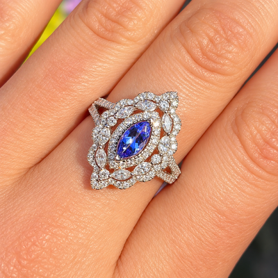'The Victoria' Marquise Tanzanite and Diamond 18ct White Gold Ring