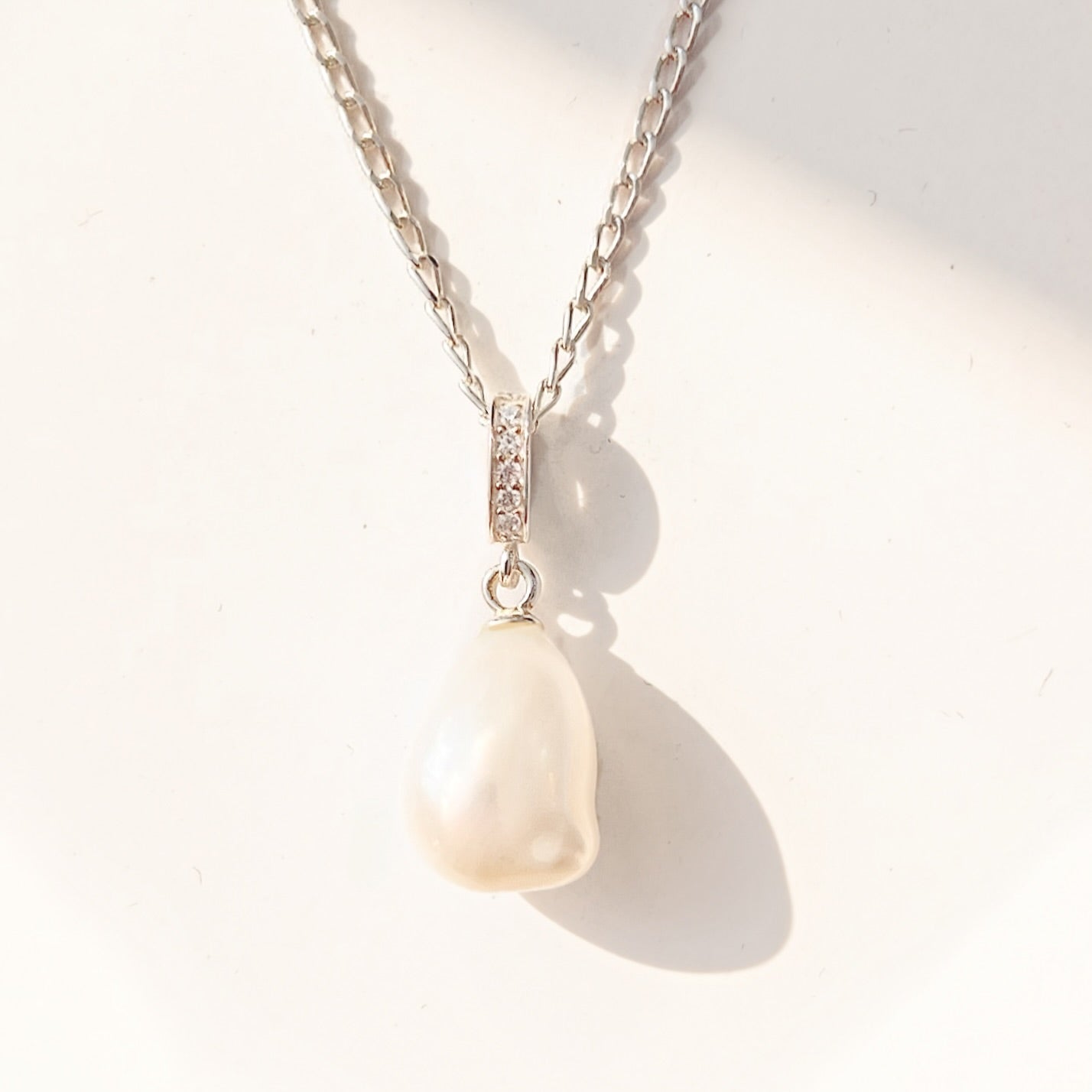 Elegant Sterling Silver Pearl and Cubic Zirconia Droplet Necklace