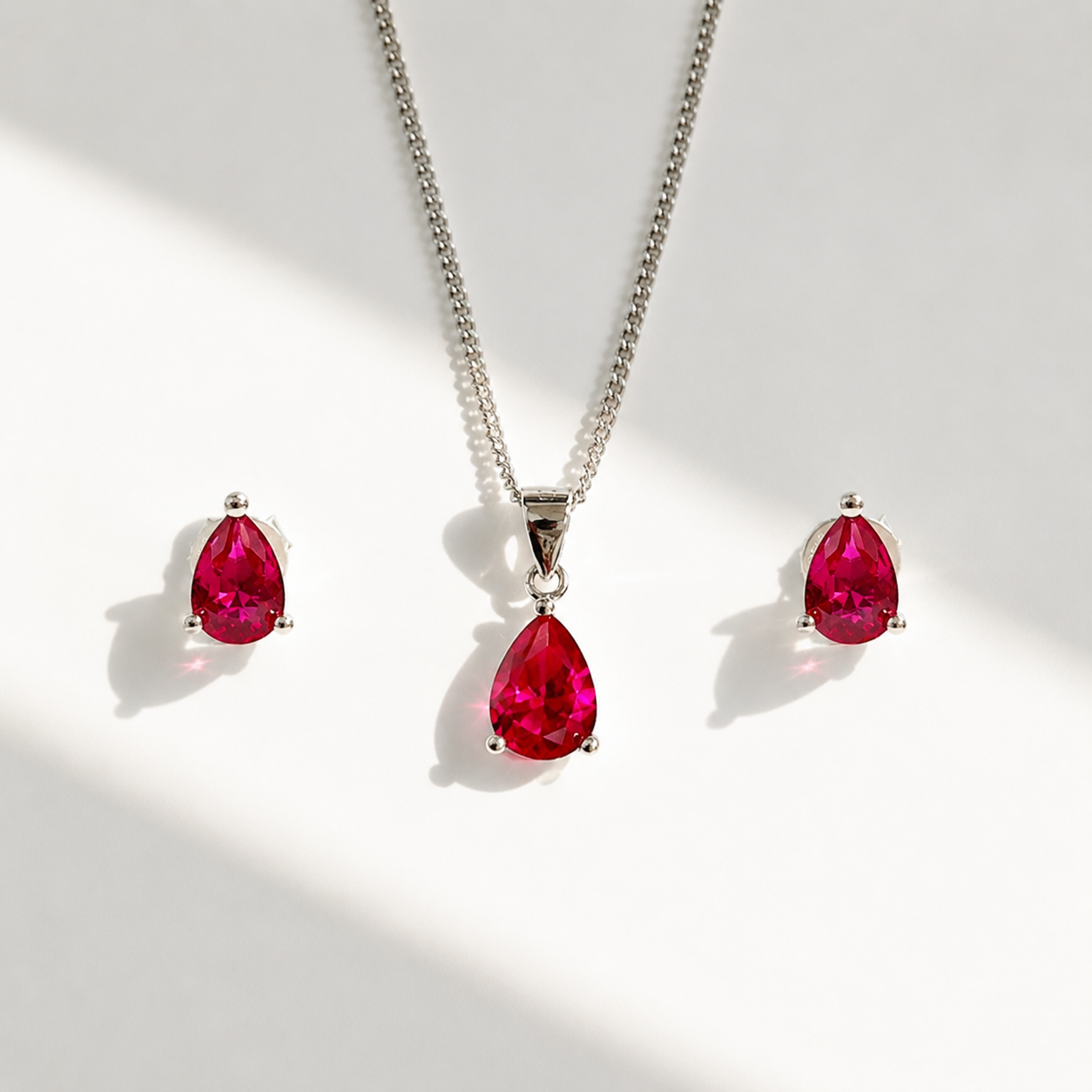 Sterling Silver Pear-Cut Lab-Grown Ruby Matching Necklace and Earring Set