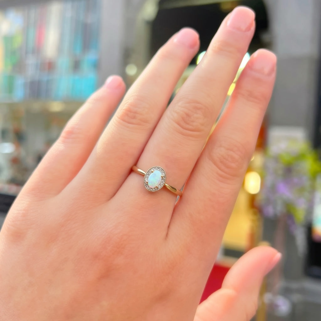 Oval Opal and Diamond 9ct Yellow Gold Halo Ring | Size O