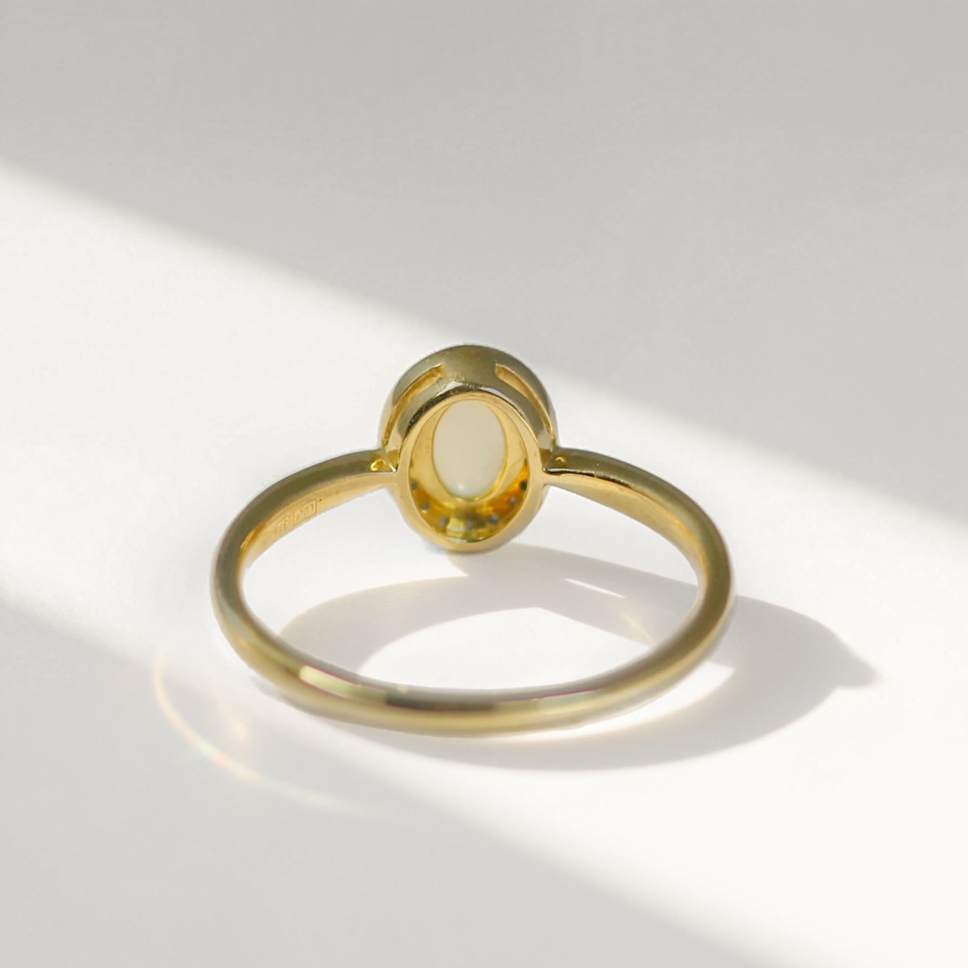 Oval Opal and Diamond 9ct Yellow Gold Halo Ring | Size O