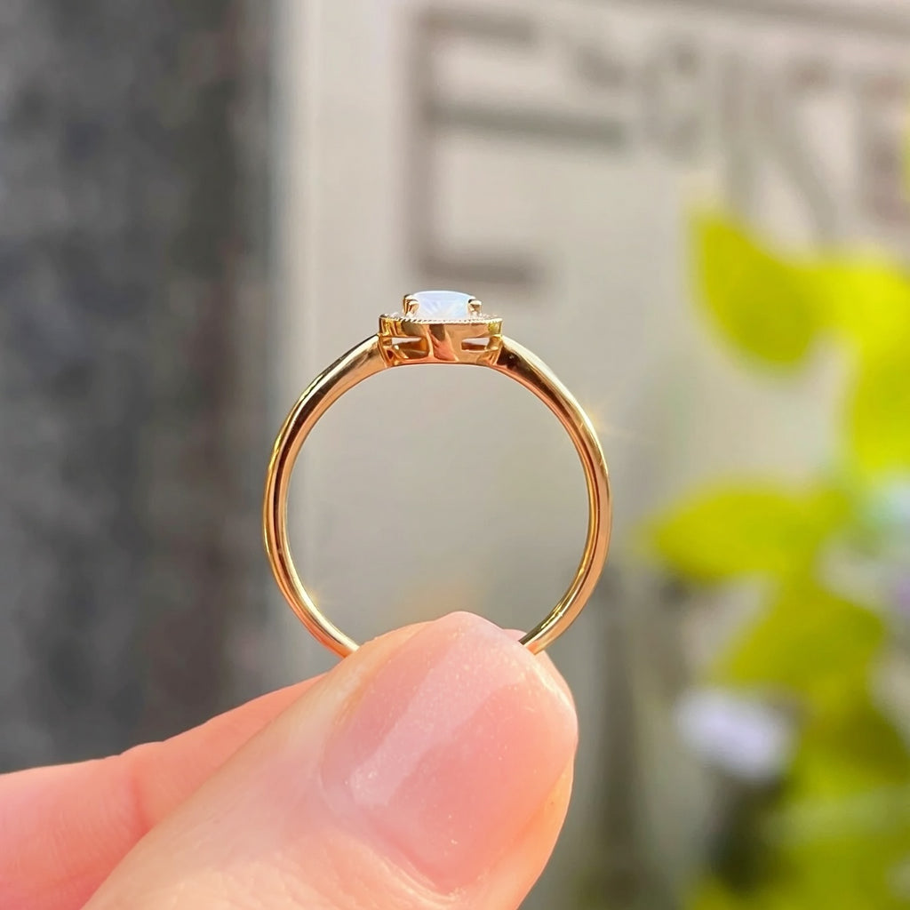 Oval Opal and Diamond 9ct Yellow Gold Halo Ring | Size O