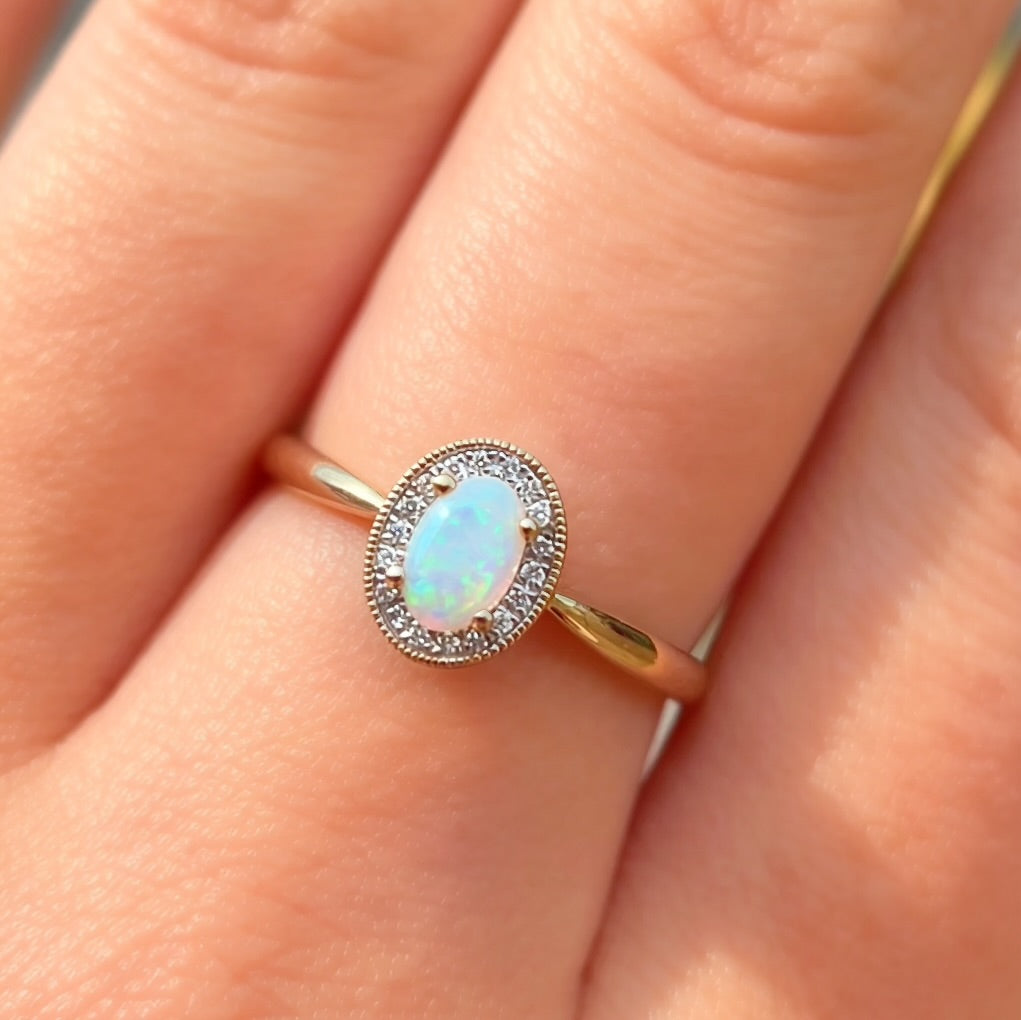 Oval Opal and Diamond 9ct Yellow Gold Halo Ring | Size O