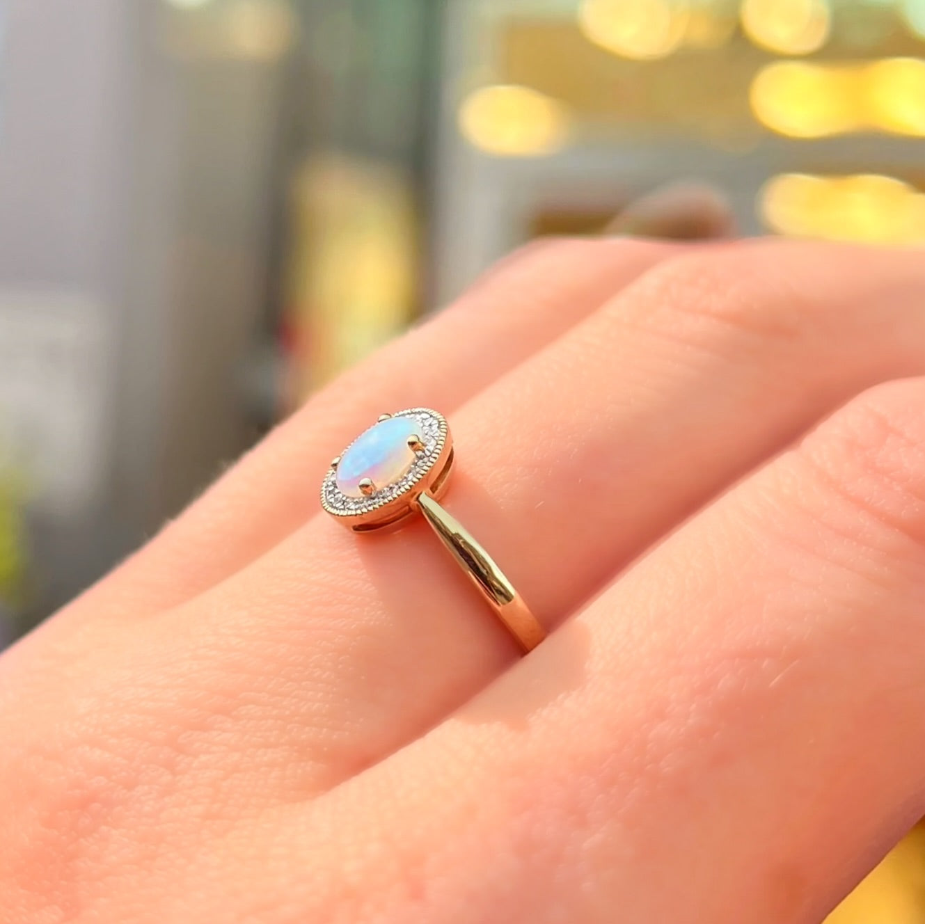 Oval Opal and Diamond 9ct Yellow Gold Halo Ring | Size O