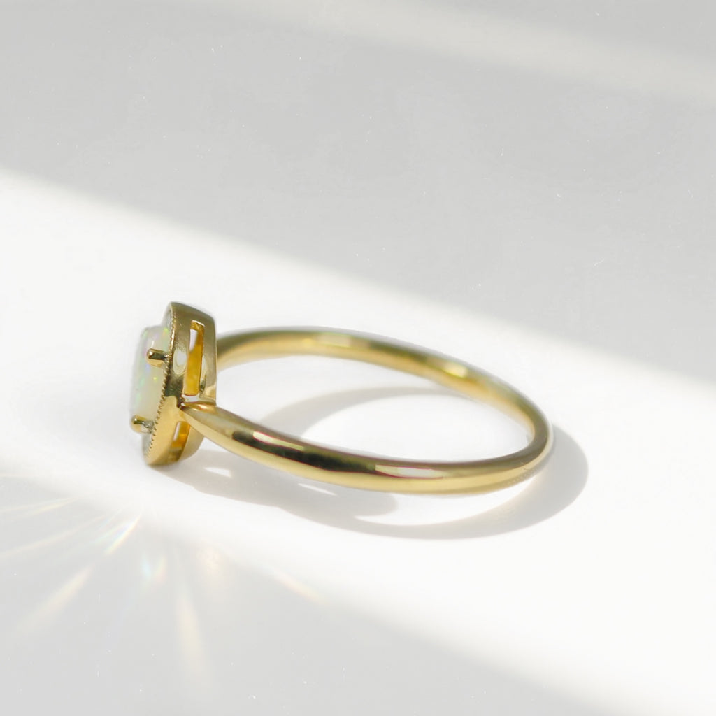 Oval Opal and Diamond 9ct Yellow Gold Halo Ring | Size O