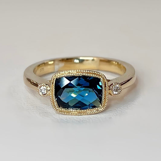 PRE-ORDER Intriguing 9ct Yellow Gold London Blue Topaz and Diamond Ring