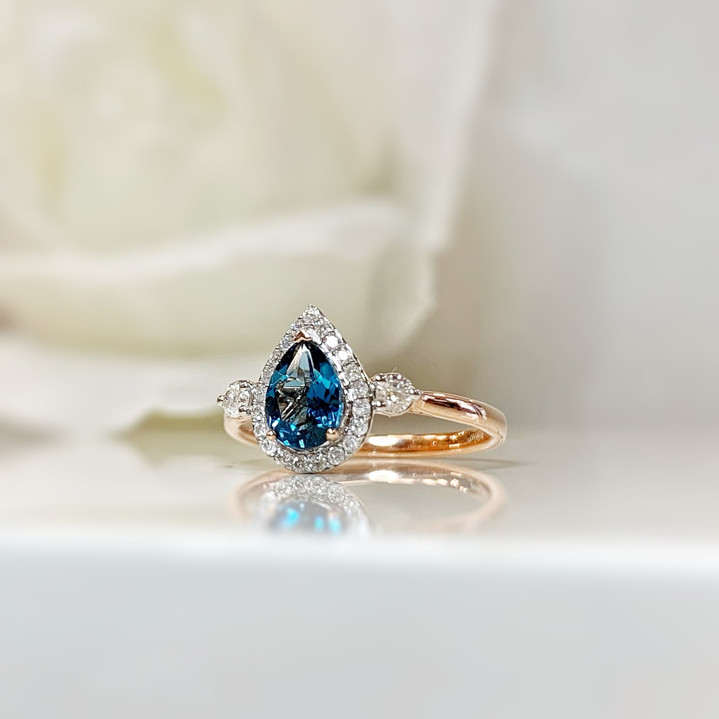 9ct Rose Gold London Blue Topaz and Diamond Ring