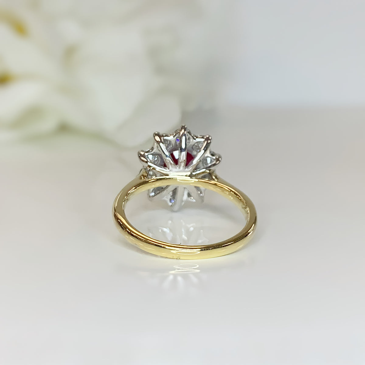 18ct Yellow Gold Ruby And Diamond Halo Ring
