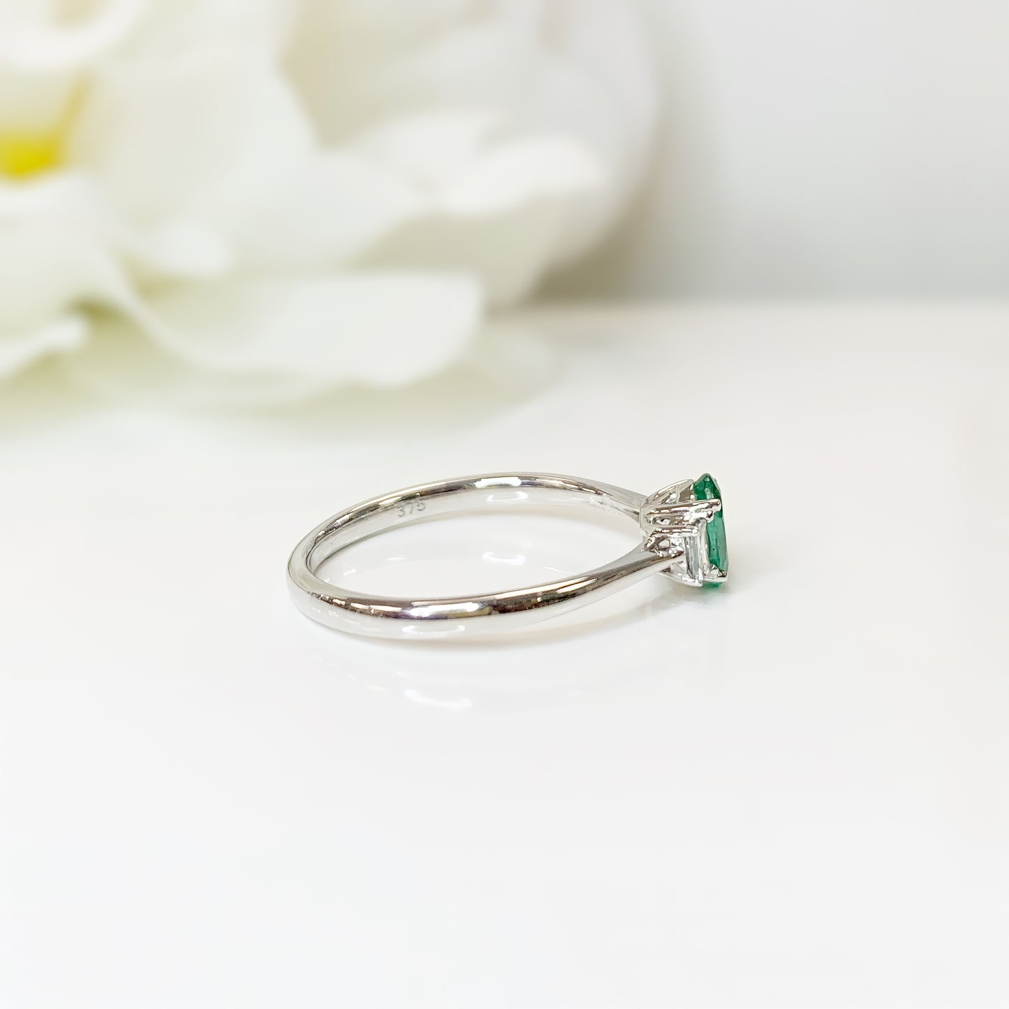 9ct White Gold Emerald and Diamond Three Stone Ring - SIZE O